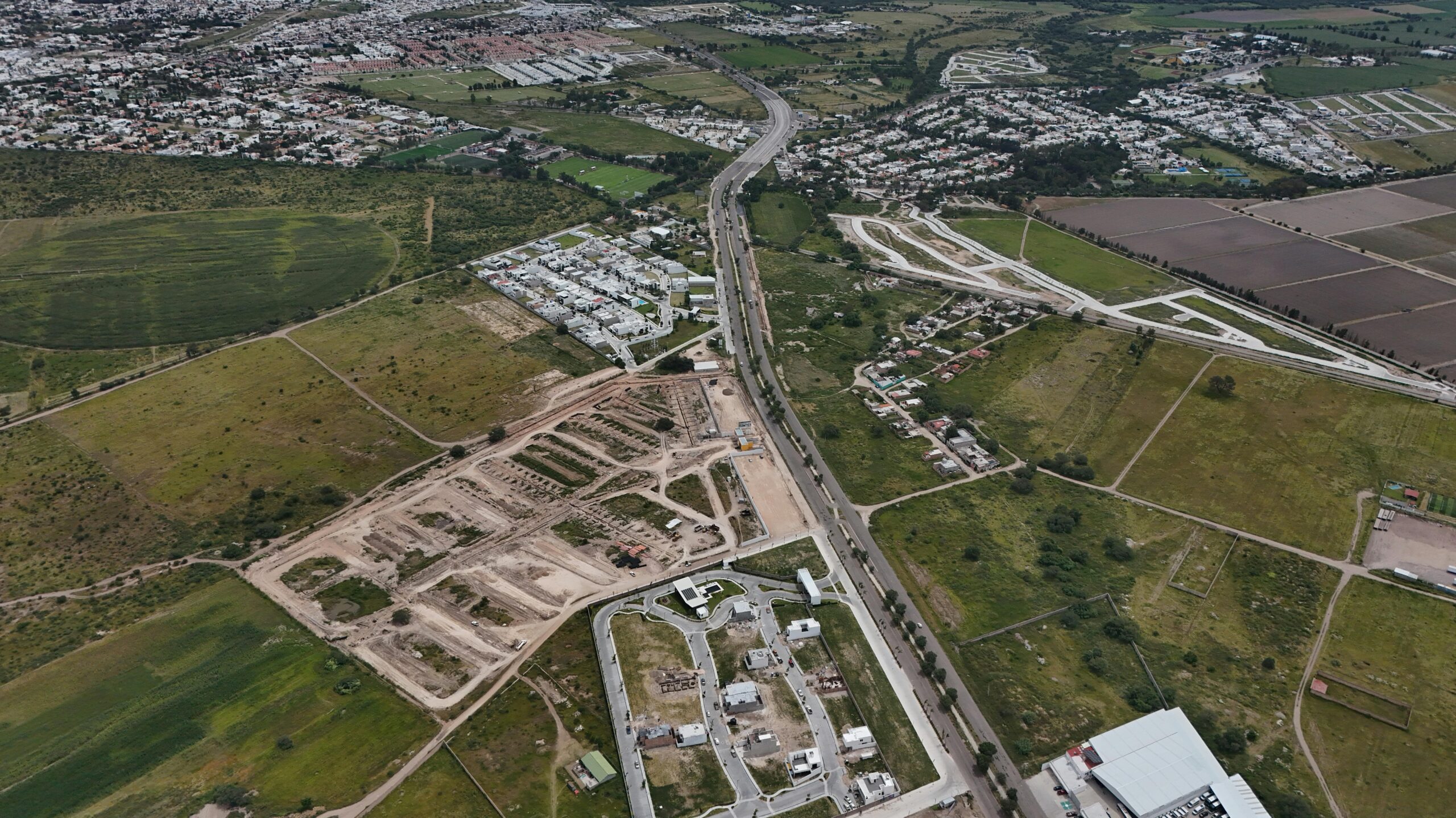 Aerial shot showcasing urban development and cityscape in Aguascalientes, Mexico.